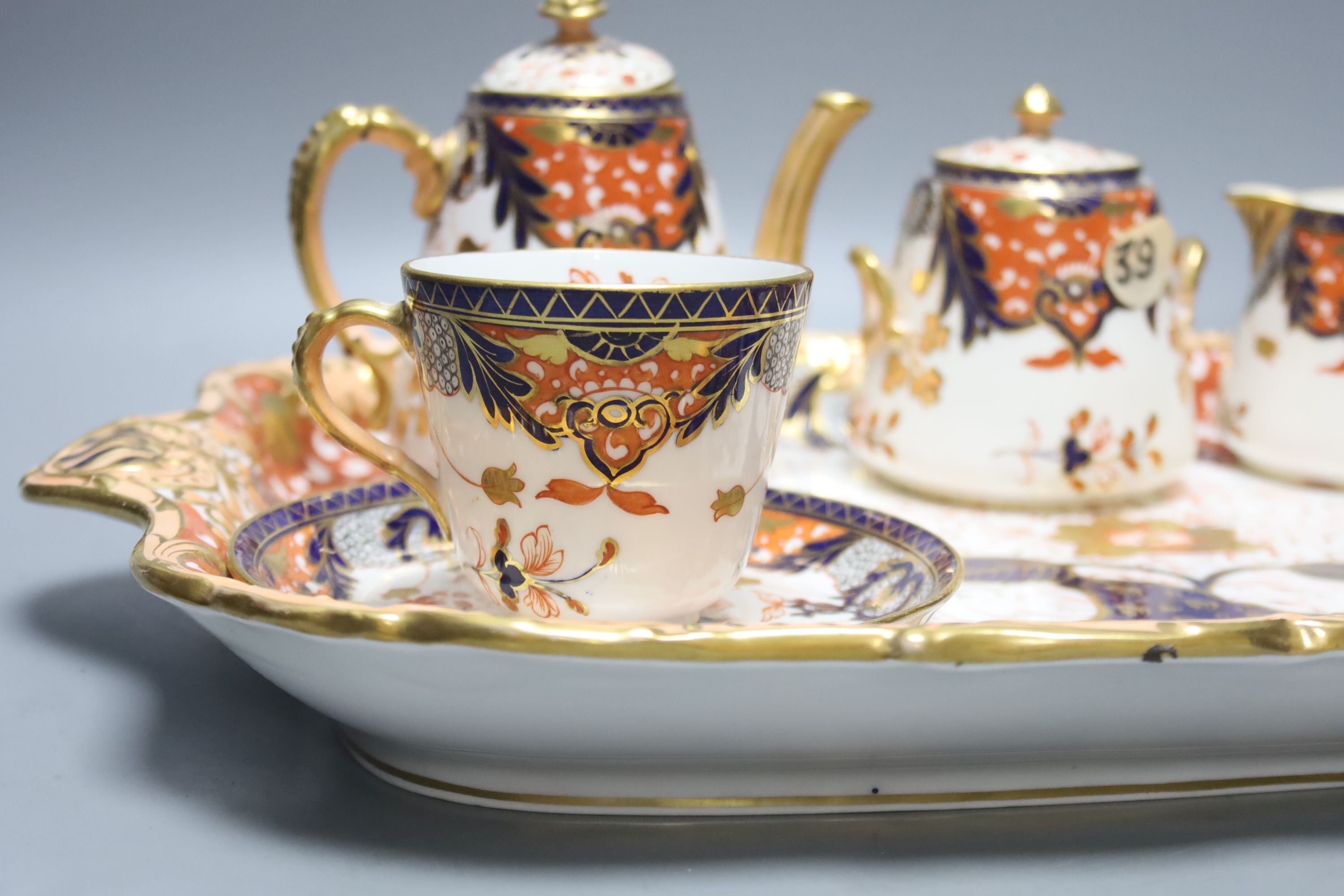 A Davenport Imari pattern tete a tete cabaret set, tray width 46cm